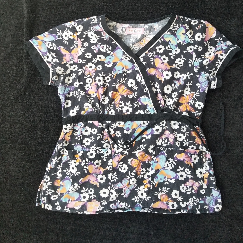 Gently used koi scrub top